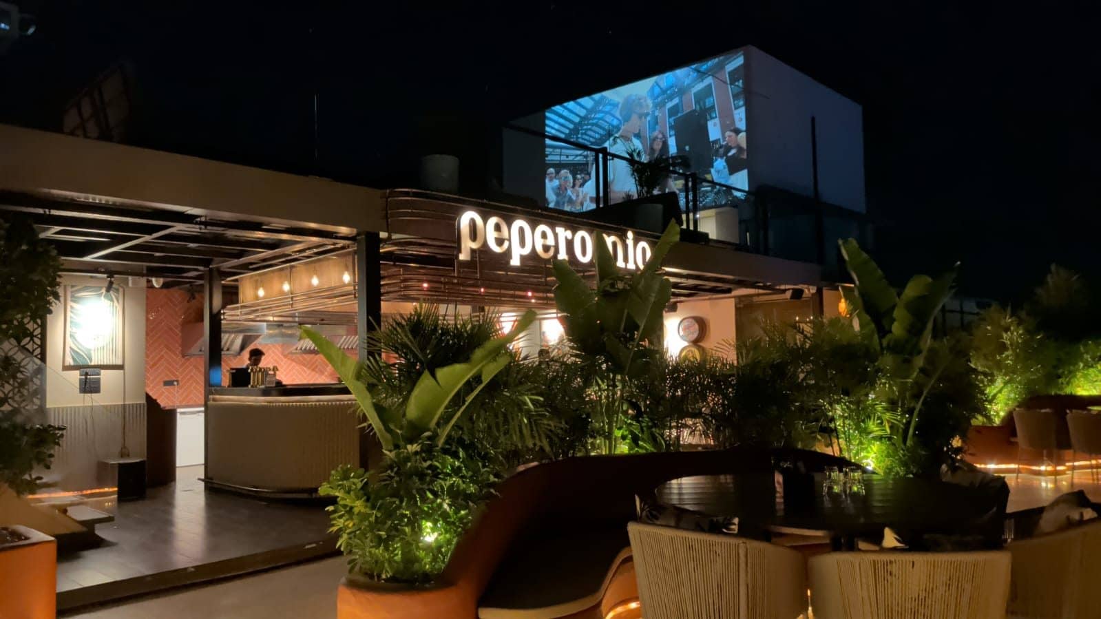 The Peperomia rooftop on Mukhani Road, Haldwani, lit up at night